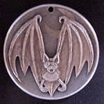 'Bat' carveing in a silver USA 1964 (Kennedy silver half $) 1a